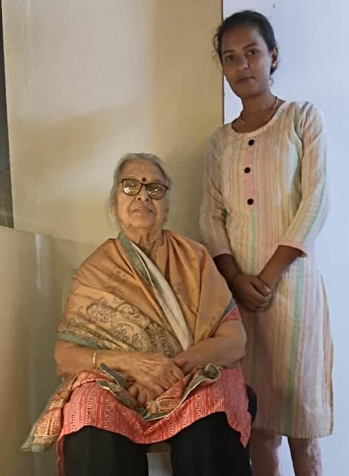 A Ganesha caregiver with an elderly client