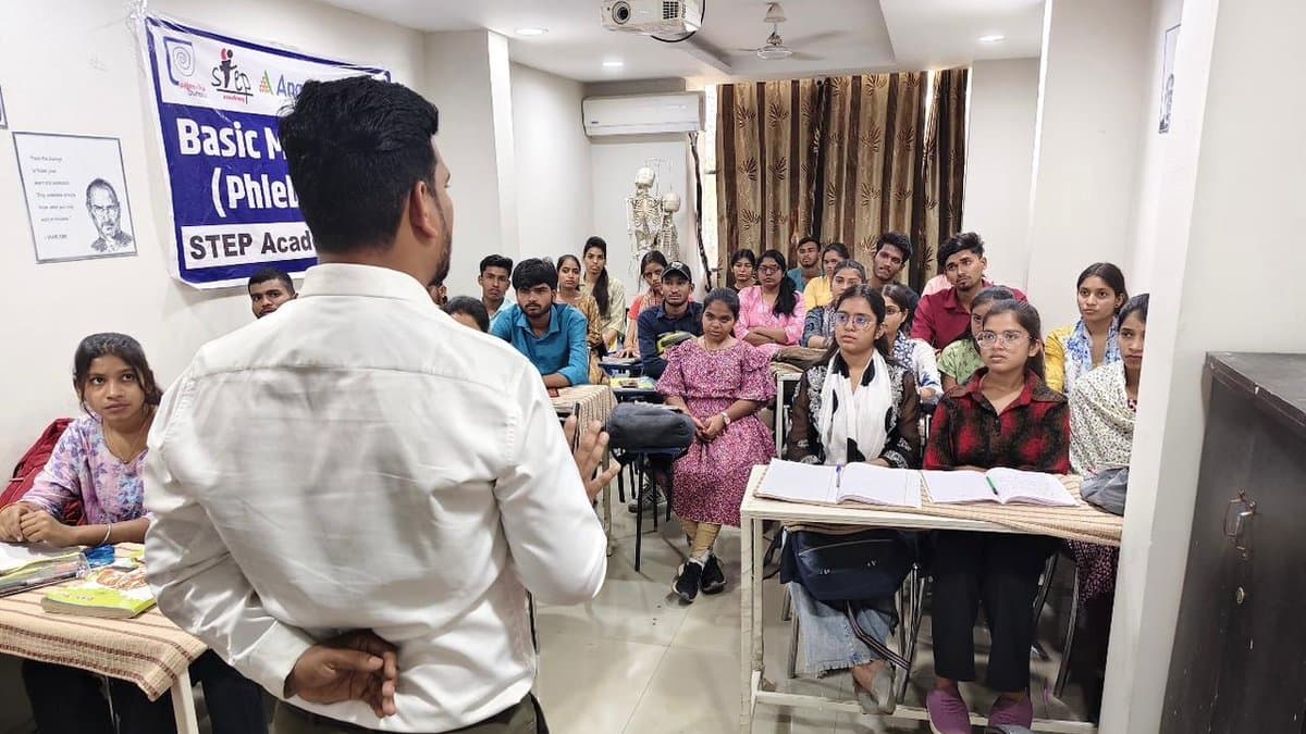 Devendra Lalawat leading a phlebotomy training session at STEP Academy